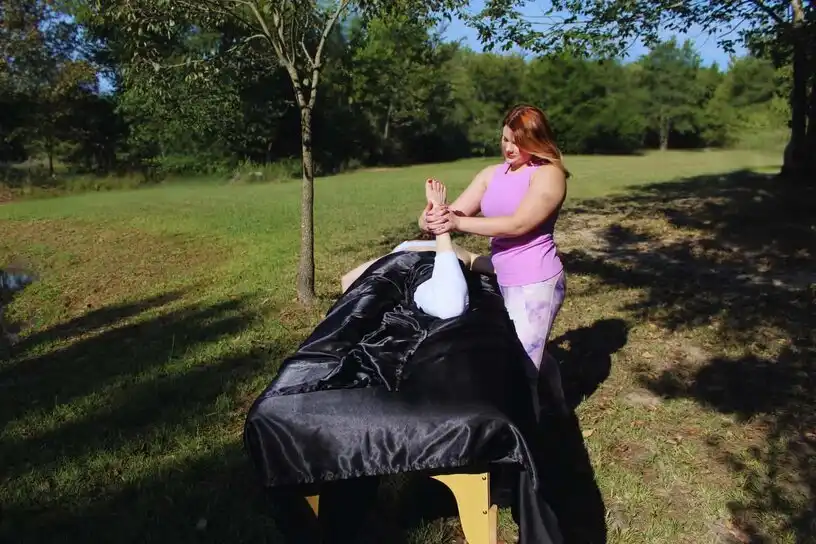 Close-up of hands performing therapeutic massage technique
